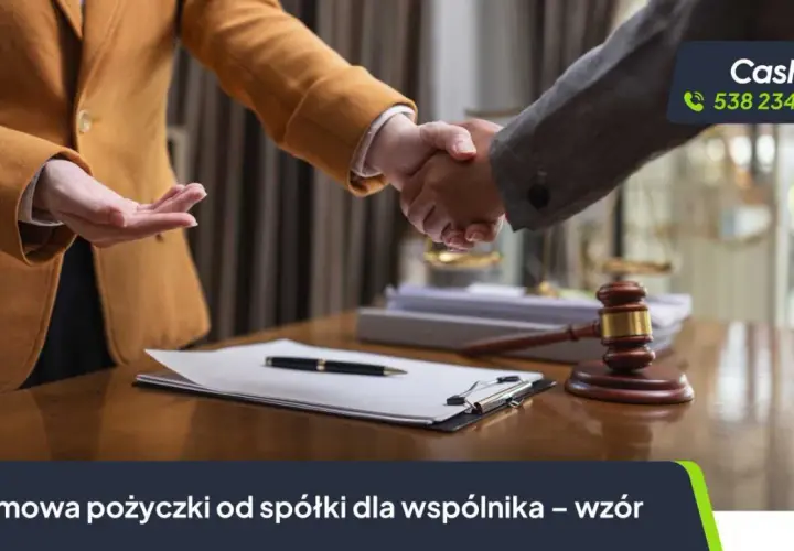 Dwie osoby ściskają sobie dłonie nad dokumentami, symbolizując umowę pożyczki od spółki dla wspólnika.