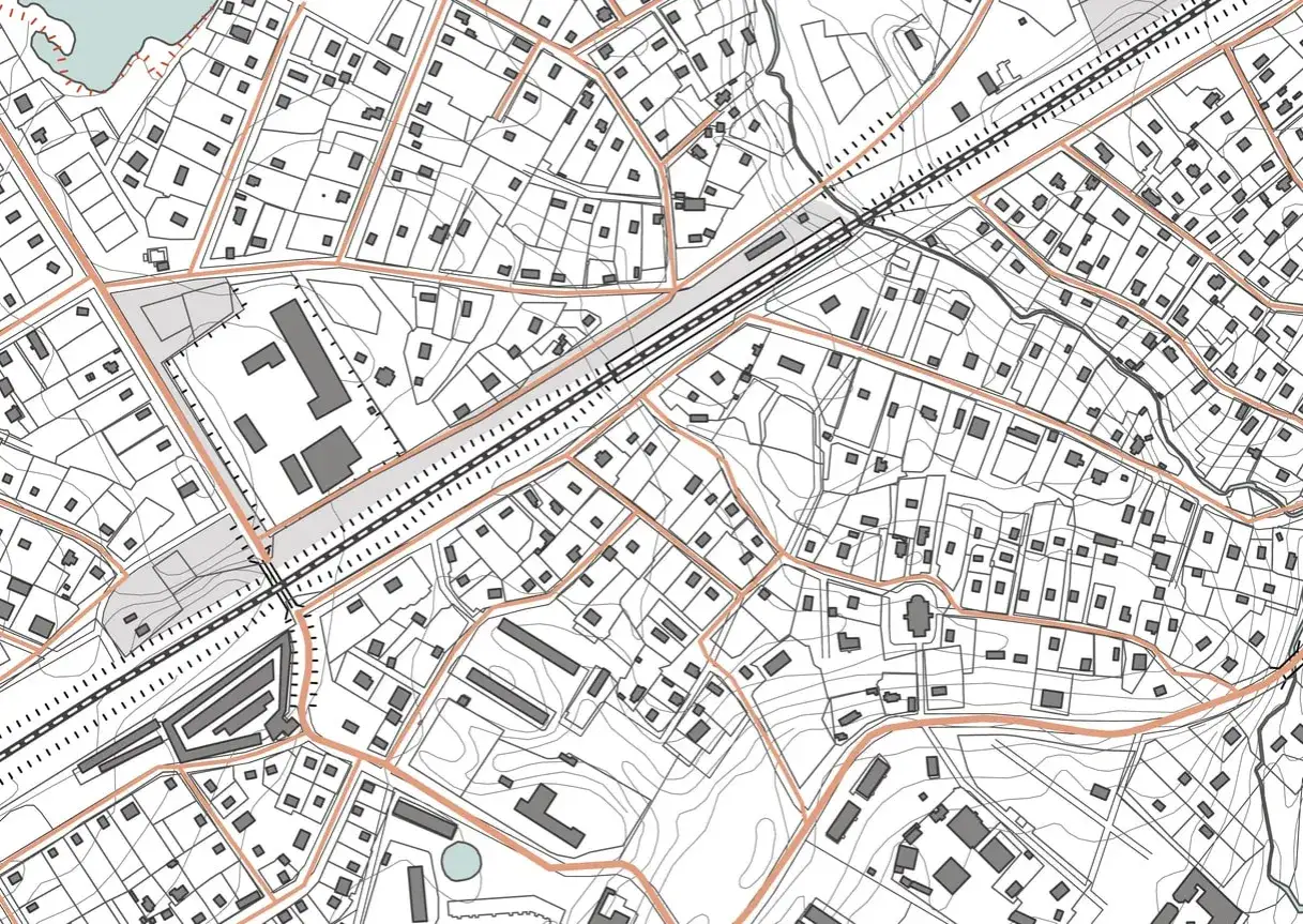 Plan sytuacyjny działki z zaznaczonymi budynkami, drogami i liniami konturowymi.